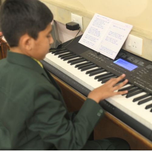 Student Playing Piano